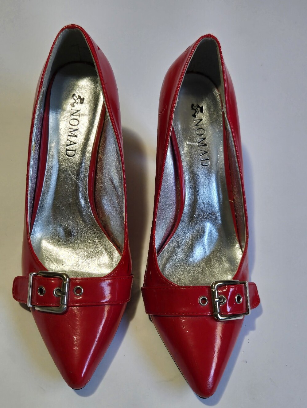 Nomad Red Pointed-Toe Buckle Pumps